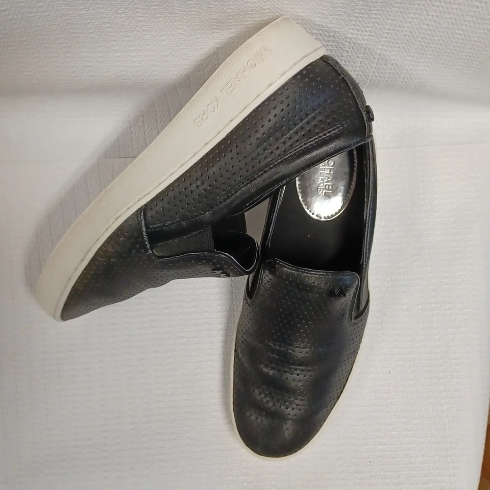 Michael Kors slip-on perforated black leather S 5M great condition
